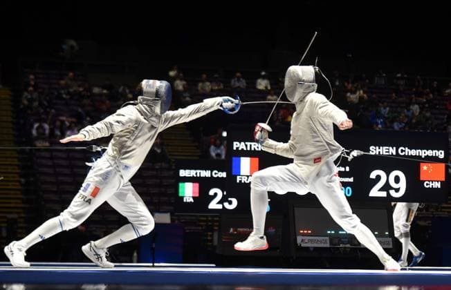 (260730) -- HONG KONG, July 30, 2026 -- Shen Chenpeng (R) of China competes with Jean-Philipp Patrice of France during the team men s sabre quarterfinal match between China and France at the 2026 Fencing World Championships in Hong Kong, south China, July 30, 2026. ) (SP)CHINA-HONG KONG-FENCING-WORLD CHAMPIONSHIPS-MEN S SABRE-TEAM (CN) LoxPingxFai 