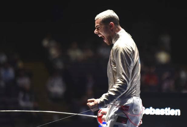 (260730) -- HONG KONG, July 30, 2026 -- Sebastien Patrice of France reacts during the team men s sabre quarterfinal match between China and France at the 2026 Fencing World Championships in Hong Kong, south China, July 30, 2026. ) (SP)CHINA-HONG KONG-FENCING-WORLD CHAMPIONSHIPS-MEN S SABRE-TEAM (CN) LoxPingxFai 
