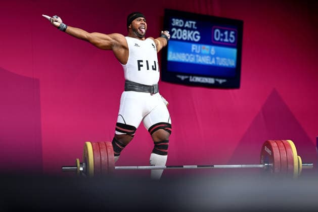 COM26 WEIGHTLIFTING, Taniela Tuisuva Rainibogi of Fiji celebrates a successful lift in the Men™s 110kg Weightlifting during the Glasgow 2026 Commonwealth Games at the SEC Armadillo in Glasgow, Scotland, Thursday, July 30, 2026. ( NO ARCHIVING, EDITORIAL USE ONLY Glasgow Scotland United Kingdom  Copyright: xLUKASxCOCHx 20260730191258134552
