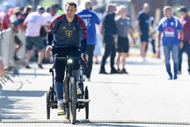 Rottach - Egern, Deutschland, 30.07.26: Torwart Manuel Neuer (FC Bayern München) Schaut, auf dem Fahrrad waehrend des Friedly Match Spiels zwischen dem FC Rottach - Egern vs FC Bayern München im Stadion am Birkenmoos am 30. Juli 2026 in Rottach - Egern, Deutschland. (Foto von Harry Langer DeFodi Images) Rottach - Egern, Germany, 30.07.26: Torwart Manuel Neuer (FC Bayern München) Looks on during the Friedly Match match between FC Rottach - Egern vs FC Bayern München at Stadion am Birkenmoos on July 30, 2026 in Rottach - Egern, Germany. (Photo by Harry Langer DeFodi Images) DFB DFL REGULATIONS PROHIBIT ANY USE OF PHOTOGRAPHS AS IMAGE SEQUENCES AND OR QUASI-VIDEO. (Photo by Harry Langer DeFodi Images) DFB DFL REGULATIONS PROHIBIT ANY USE OF PHOTOGRAPHS AS IMAGE SEQUENCES AND OR QUASI-VIDEO. - *** Rottach Egern, Germany, July 30, 2026: Goalkeeper Manuel Neuer of FC Bayern Munich looks on while riding a bicycle during the friendly match between FC Rottach Egern and FC Bayern Munich at the Stadion am Birkenmoos on July 30, 2026, in Rottach Egern, Germany. Photo by Harry Langer, DeFodi Images. Rottach Egern, Germany, July 30, 2026. Goalkeeper Manuel Neuer of FC Bayern Munich looks on during the friendly match between FC Rottach Egern and FC Bayern Munich at Stadion am Birkenmoos on July 30, 2026 in Rottach Egern, Germany. Photo by Harry Langer, DeFodi Images. DFB and DFL regulations prohibit any use of photographs as image sequences and or quasi-video. Photo by Harry Langer, DeFodi Images. DFB and DFL regulations prohibit any use of photographs as imSEQUENCES AND OR QUASI-VIDEO