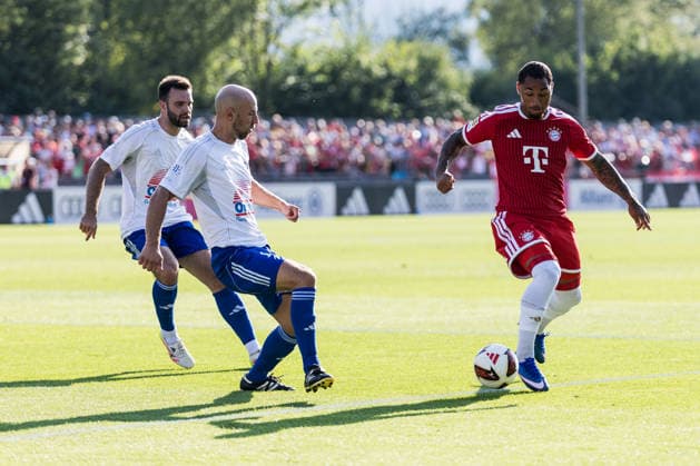 ROTTACH-EGERN, GERMANY - JULY 30: Armindo Sieb (FC Bayern Muenchen, 36) controls the ball against Markus Stoeckl (Stöckl, Stockl, FC Rottach-Egern, 2) during a friendly game between FC Rottach-Egern vs. FC Bayern Muenchen at summer trainings camp of season 2026 27 of FC Bayern Muenchen in Rottach-Egern at Stadion am Birkenmoos on July 30, 2026 in Rottach-Egern, Germany. Bavaria Germany Copyright: xSteffiexWunderlx