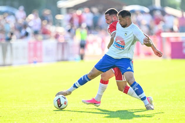 Rottach - Egern, Deutschland, 30.07.26: Arijon Ibrahimovic (FC Bayern München) und Samet Yilmazer (FC Rottach-Egern) im Zweikampf waehrend des Friedly Match Spiels zwischen dem FC Rottach - Egern vs FC Bayern München im Stadion am Birkenmoos am 30. Juli 2026 in Rottach - Egern, Deutschland. (Foto von Harry Langer DeFodi Images) Rottach - Egern, Germany, 30.07.26: Arijon Ibrahimovic (FC Bayern München) und Samet Yilmazer (FC Rottach-Egern) battle for the ball during the Friedly Match match between FC Rottach - Egern vs FC Bayern München at Stadion am Birkenmoos on July 30, 2026 in Rottach - Egern, Germany. (Photo by Harry Langer DeFodi Images) DFB DFL REGULATIONS PROHIBIT ANY USE OF PHOTOGRAPHS AS IMAGE SEQUENCES AND OR QUASI-VIDEO. (Photo by Harry Langer DeFodi Images) DFB DFL REGULATIONS PROHIBIT ANY USE OF PHOTOGRAPHS AS IMAGE SEQUENCES AND OR QUASI-VIDEO. - *** Rottach Egern, Germany, July 30, 2026: Arijon Ibrahimovic of FC Bayern Munich and Samet Yilmazer of FC Rottach Egern go head-to-head during the friendly match between FC Rottach Egern and FC Bayern Munich at the Birkenmoos Stadium on July 30, 2026, in Rottach Egern, Germany. Photo by Harry Langer, DeFodi Images. Rottach Egern, Germany, July 30, 2026: Arijon Ibrahimovic of FC Bayern Munich and Samet Yilmazer of FC Rottach Egern battle for the ball during the friendly match between FC Rottach Egern and FC Bayern Munich at Stadion am Birkenmoos on July 30, 2026, in Rottach Egern, Germany Photo by Harry Langer DeFodi Images DFB and DFL regulations prohibit any use of photographs as image sequences and or quasi-video Photo by Harry Langer DeFodi Images DFB and DFL regulations prohibit any use of photographs as imSEQUENCES AND OR QUASI-VIDEO