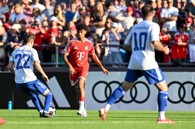 Rottach - Egern, Deutschland, 30.07.26: Michael Lamm (FC Rottach-Egern), Nathaniel Brown (FC Bayern München) und Fethullah Sourtsoglou (FC Rottach-Egern) im Zweikampf waehrend des Friedly Match Spiels zwischen dem FC Rottach - Egern vs FC Bayern München im Stadion am Birkenmoos am 30. Juli 2026 in Rottach - Egern, Deutschland. (Foto von Harry Langer DeFodi Images) Rottach - Egern, Germany, 30.07.26: Michael Lamm (FC Rottach-Egern), Nathaniel Brown (FC Bayern München) und Fethullah Sourtsoglou (FC Rottach-Egern) battle for the ball during the Friedly Match match between FC Rottach - Egern vs FC Bayern München at Stadion am Birkenmoos on July 30, 2026 in Rottach - Egern, Germany. (Photo by Harry Langer DeFodi Images) DFB DFL REGULATIONS PROHIBIT ANY USE OF PHOTOGRAPHS AS IMAGE SEQUENCES AND OR QUASI-VIDEO. (Photo by Harry Langer DeFodi Images) DFB DFL REGULATIONS PROHIBIT ANY USE OF PHOTOGRAPHS AS IMAGE SEQUENCES AND OR QUASI-VIDEO. - *** Rottach Egern, Germany, July 30, 2026 Michael Lamm, FC Rottach Egern, Nathaniel Brown of FC Bayern Munich and Fethullah Sourtsoglou of FC Rottach Egern in a tackle during the friendly match between FC Rottach Egern and FC Bayern Munich at Stadion am Birkenmoos on July 30, 2026, in Rottach Egern, Germany. Photo by Harry Langer, DeFodi Images. Rottach Egern, Germany, July 30, 2026. Michael Lamm (FC Rottach Egern), Nathaniel Brown of FC Bayern Munich and Fethullah Sourtsoglou of FC Rottach Egern battle for the ball during the friendly match between FC Rottach Egern and FC Bayern Munich at Stadion am Birkenmoos on July 30, 2026, in Rottach Egern, Germany Photo by Harry Langer DeFodi Images DFB and DFL regulations prohibit any use of photographs as image sequences and or quasi-video Photo by Harry Langer DeFodi Images DFB and DFL regulations prohibit any use of photographs as imSEQUENCES AND OR QUASI-VIDEO