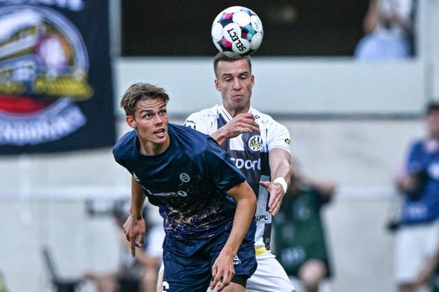 L-R Jens Hjerto Dahl of Tromso IL and Daniel Dancak of Hradec Kralove in action during the second leg of the Europa League second qualifying round between FC Hradec Kralove and Tromso IL, Hradec Kralove, July 30, 2026. (CTKxPhoto DavidxTanecek) CTKPhotoP2026073007744  CTKPhotoP2026073007744