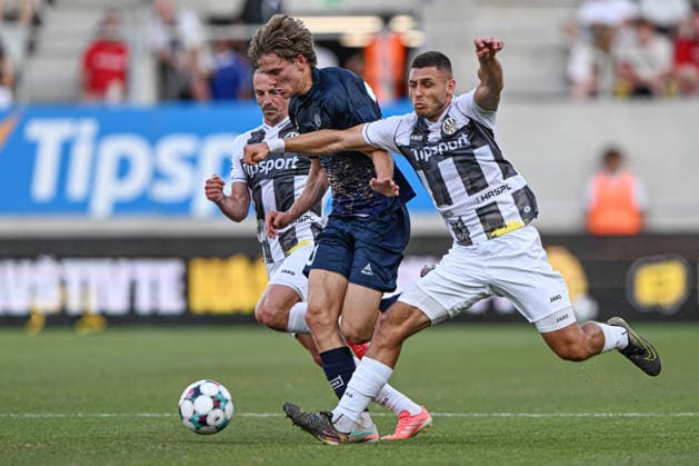L-R Vladimir Darida of Hradec Kralove, Isak Vadebu of Tromso IL, and Jakub Kucera of Hradec Kralove in action during the second leg of the Europa League second qualifying round between FC Hradec Kralove and Tromso IL, Hradec Kralove, July 30, 2026. (CTKxPhoto DavidxTanecek) CTKPhotoP2026073008117  CTKPhotoP2026073008117