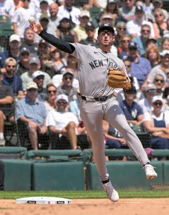 New York Yankees third baseman Ryan McMahon (19) is late on the throw to first against the Chicago White Sox during the first inning at Rate Field in Chicago, IL on Thursday, July 30, 2026.  CHI20260730104 MARKxBLACK
