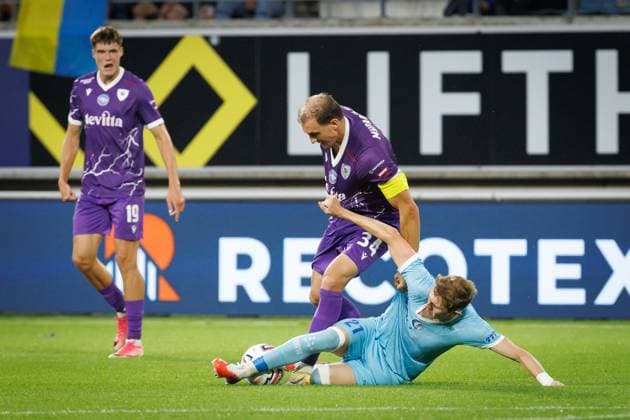 Cherkasy s Nazarii Muravskyi and Gent s Max Dean fight for the ball during a soccer game between Belgian KAA Gent and Ukrainian FC LNZ Cherkasy, Thursday 30 July 2026 in Gent, the return leg of the second qualifying round for the UEFA Conference League. The first leg ended in a 0-0 draw. KURTxDESPLENTER  x182425323x