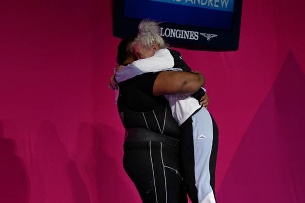 COM26 WEIGHTLIFTING, David Andrew Liti of New Zealand celebrates with coach Tina Ball after winning gold during the Men™s +110kg Weightlifting of the Glasgow 2026 Commonwealth Games at the SEC Armadillo in Glasgow, Scotland, Thursday, July 30, 2026. ( NO ARCHIVING, EDITORIAL USE ONLY Glasgow United Kingdom  Copyright: xLUKASxCOCHx 20260731164492856840