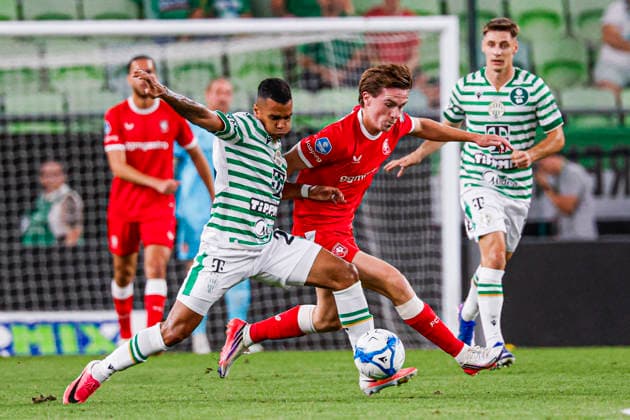BUDAPEST, HUNGARY - JULY 30: Daan Rots of FC Twente battles for possession with Cadu of Ferencvaros during the UEFA Europa League 2026 27 Second Qualifying Round Second Leg match between Ferencvaros and FC Twente at Groupama Arena on July 30, 2026 in Budapest, Hungary.  Copyright: xMTB-Photo MB-Mediax