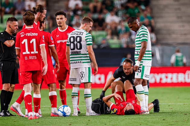 BUDAPEST, HUNGARY - JULY 30: Ramiz Zerrouki of FC Twente lies on the ground with an injury during the UEFA Europa League 2026 27 Second Qualifying Round Second Leg match between Ferencvaros and FC Twente at Groupama Arena on July 30, 2026 in Budapest, Hungary.  Copyright: xMTB-Photo MB-Mediax