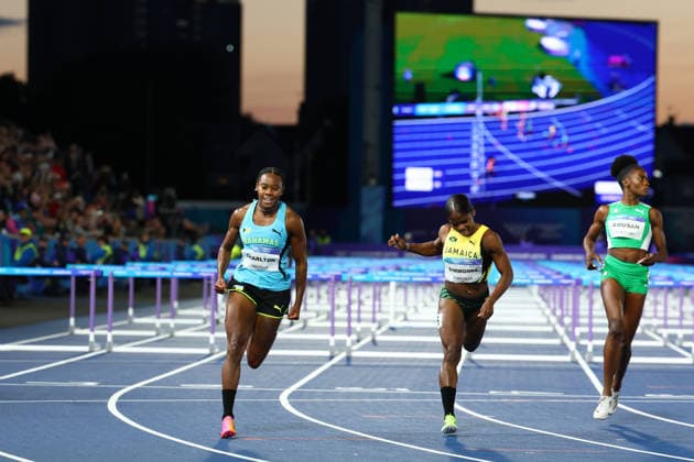 July 30, 2026, Glasgow, Scotland, Great Britain: DEVYNNE CHARLTON of The Bahamas reacts to winning ahead MEGAN SIMMONDS of Jamaica and TOBI AMUSAN of Nigeria in the Athletics Women s 100m hurdles Final of the Commonwealth Games Glasgow 2026 at the Scotstoun Stadium in Glasgow, Scotland. Glasgow Great Britain - ZUMAc179 20260730_zep_c179_017 Copyright: xMickaelxChavetx