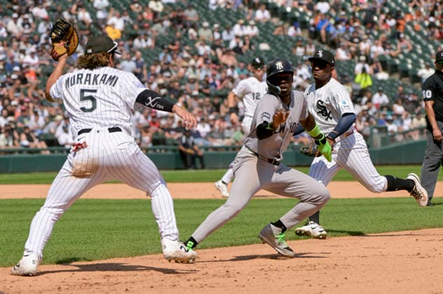 New York Yankees Jazz Chisholm Jr. (13) gets caught in a rundown between 1st and 2nd during the seventh inning at Rate Field in Chicago, IL on Thursday, July 30, 2026. The White Sox defeated the Yankees 2-1.  CHI20260730120 MARKxBLACK