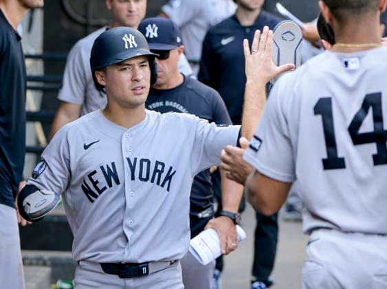 New York Yankees Anthony Volpe (11) celebrates scoring on a single by Trent Grisham in the tenth inning against the Chicago White Sox at Rate Field in Chicago, IL on Thursday, July 30, 2026. The White Sox defeated the Yankees 2-1.  CHI20260730131 MARKxBLACK