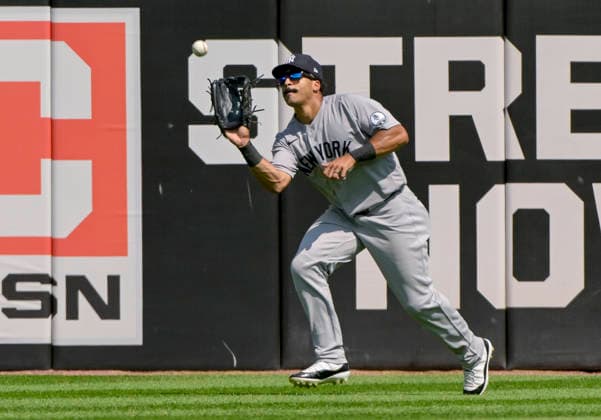 New York Yankees center fielder Trent Grisham (12) makes the catch for an out against the Chicago White Sox during the seventh inning at Rate Field in Chicago, IL on Thursday, July 30, 2026. The White Sox defeated the Yankees 2-1.  CHI20260730122 MARKxBLACK