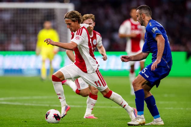 AMSTERDAM, NETHERLANDS - JULY 30: Mika Godts of AFC Ajax dribbles with the ball during the UEFA Conference League 2026 27 second qualifying round second leg match between AFC Ajax and at Johan Cruijff Arena on July 30, 2026 in Amsterdam, Netherlands.  Copyright: xRenexNijhuis MBxMediax