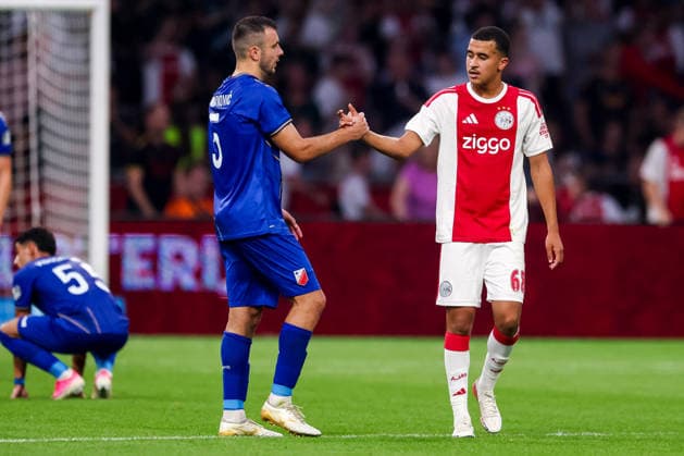 AMSTERDAM, NETHERLANDS - JULY 30: Djordje Crnomarkovic of FK Vojvodina and Abdellah Ouazane of AFC Ajax shake hands after the UEFA Conference League 2026 27 second qualifying round second leg match between AFC Ajax and at Johan Cruijff Arena on July 30, 2026 in Amsterdam, Netherlands.  Copyright: xRenexNijhuis MBxMediax