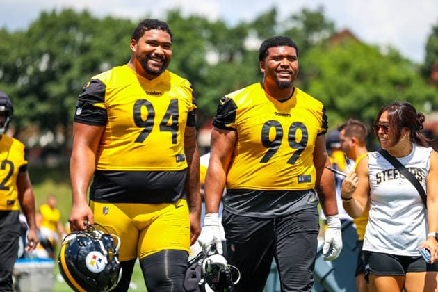 July 30, 2026, Latrobe, Pennsylvania, USA: Pittsburgh Steelers defensive linemen YAHYA BLACK (94) and DERRICK HARMON (99) laugh while leaving the practice field during the Pittsburgh Steelers Training Camp in Latrobe, Pennsylvania. NFL, American Football Herren, USA 2026: Pittsburgh Steelers Training Camp  - ZUMAg257 20260730_zsp_g257_018 Copyright: xBrentxGudenschwagerx