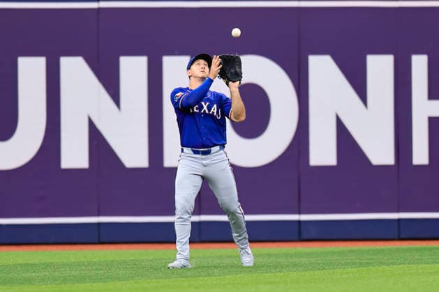 July 30, 2026, St. Petersburg, Florida, USA: Texas Rangers left fielder Wyatt Langford (36) catches a fly ball off the bat of Tampa Bay Rays center fielder Cedric Mullins (31) during an MLB, Baseball Herren, USA game on July 30, 2026 at Tropicana Field. The Rays beat the Rangers 3-2 and won the series. St. Petersburg USA - ZUMAh180 20260730_zsp_h180_014 Copyright: xKimxHukarix