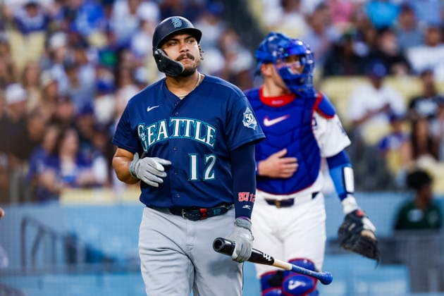 MLB, Baseball Herren, USA - Los Angeles Dodgers vs Seattle Mariners Mariners first baseman Josh Naylor reacts to striking outMariners starting pitcher Bryan Woo throws a pitch during the MLB game between the Los Angeles Dodgers and Seattle Mariners at Uniqlo Field in Dodgers Stadium in Los Angeles, California, USA, 30 July 2026. LOS ANGELES CALIFORNIA UNITED STATES  Copyright: xCHRISxTORRESx