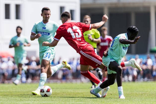 ST. JOHANN IN TIROL, AUSTRIA - JULY 31: Said El Mala (1. FC Koeln, 13) controls the ball against Boris Mamuzah Lum (Hertha BSC Berlin, 21) - foul - during a friendly game between 1. FC Koeln vs. Hertha BSC Berlin at trainings camp of 1. FC Koeln in Kitzbuehel of season 2026 27 at Koasastadion on July 31, 2026 in St. Johann in Tirol, Austria. Austria Copyright: xSteffiexWunderlx