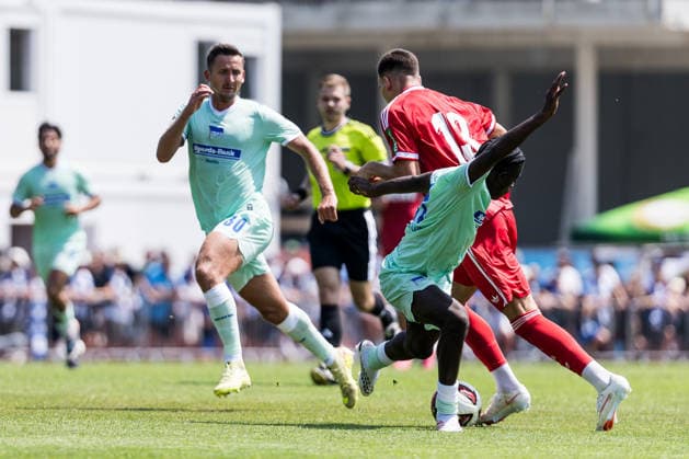 ST. JOHANN IN TIROL, AUSTRIA - JULY 31: Said El Mala (1. FC Koeln, 13) controls the ball against Boris Mamuzah Lum (Hertha BSC Berlin, 21) - foul - during a friendly game between 1. FC Koeln vs. Hertha BSC Berlin at trainings camp of 1. FC Koeln in Kitzbuehel of season 2026 27 at Koasastadion on July 31, 2026 in St. Johann in Tirol, Austria. Austria Copyright: xSteffiexWunderlx
