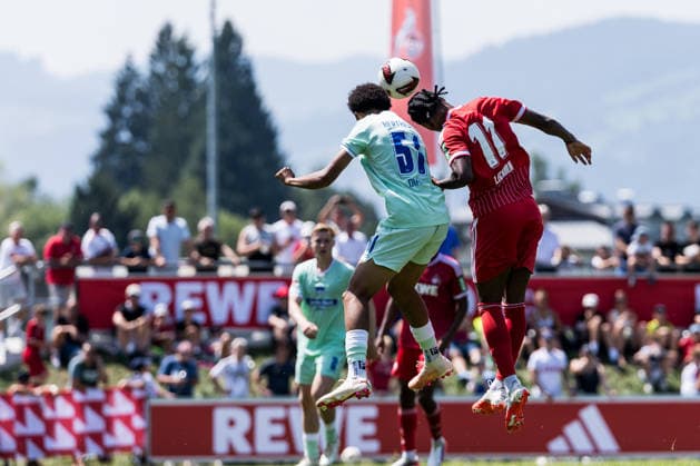 ST. JOHANN IN TIROL, AUSTRIA - JULY 31: Reigan Heskey (1. FC Koeln, 11) tries to control the ball via header against Jerome Diallo (Hertha BSC Berlin, 51) during a friendly game between 1. FC Koeln vs. Hertha BSC Berlin at trainings camp of 1. FC Koeln in Kitzbuehel of season 2026 27 at Koasastadion on July 31, 2026 in St. Johann in Tirol, Austria. Austria Copyright: xSteffiexWunderlx