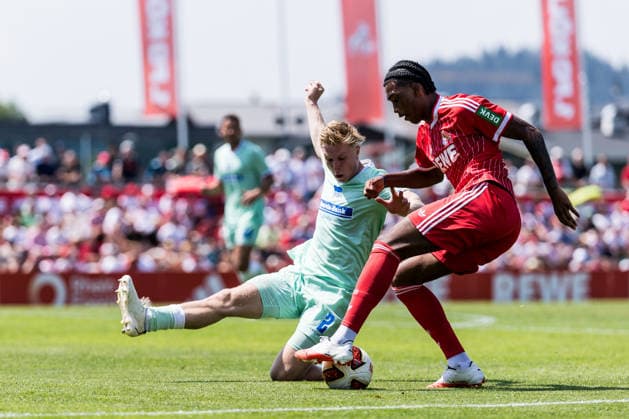 ST. JOHANN IN TIROL, AUSTRIA - JULY 31: Reigan Heskey (1. FC Koeln, 11) controls the ball against Julian Eitschberger (Hertha BSC Berlin, 2) during a friendly game between 1. FC Koeln vs. Hertha BSC Berlin at trainings camp of 1. FC Koeln in Kitzbuehel of season 2026 27 at Koasastadion on July 31, 2026 in St. Johann in Tirol, Austria. Austria Copyright: xSteffiexWunderlx