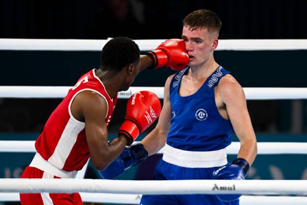 COM26 BOXING, Jacob Cassar of Australia (blue) fights Pooana Khoahli of Lesotho in the Men™s 65kg Semi-Final Bout of the Glasgow 2026 Commonwealth Games at SEC Centre in Glasgow, Scotland, Friday, July 31, 2026. ( NO ARCHIVING, EDITORIAL USE ONLY Glasgow Scotland United Kingdom  Copyright: xLUKASxCOCHx 20260731131106678471