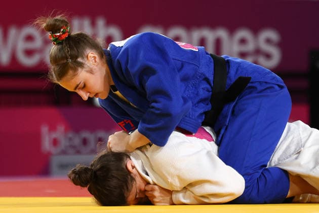July 31, 2026, Glasgow, Scotland, Great Britain: Evelyn BEATON of Canada (white) against Lola HODSON of Wales (blue) in the Women -52 kg Quarter-Final at the Commonwealth Games Glasgow 2026 in Glasgow, Scotland. Commowealth Games 2026: Judo  - ZUMAc179 20260731_zep_c179_054 Copyright: xMickaelxChavetx