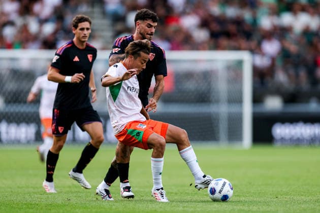 NIJMEGEN, NETHERLANDS - JULY 31: Kodai Sano of NEC Nijmegen is challenged by Isaac Romero of Sevilla FC during the pre-season friendly match between NEC Nijmegen and Sevilla FC at the Goffertstadion on July 31, 2026 in Nijmegen, Netherlands.  Copyright: xRenexNijhuis MBxMediax