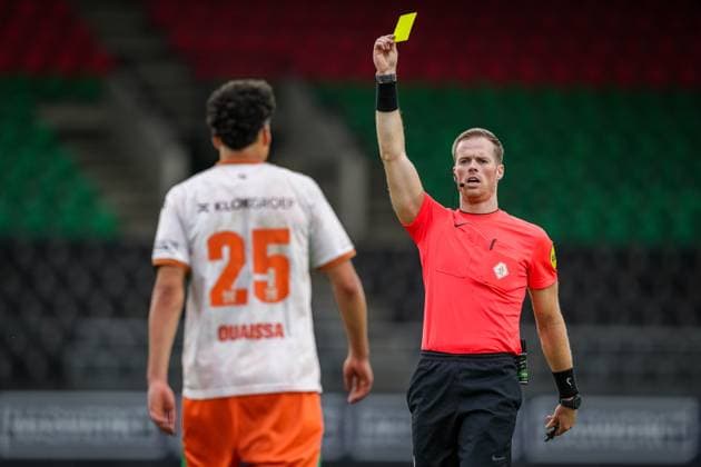 NIJMEGEN , 31-07-2026 , Stadium De Goffert , season 2026 2027 , Dutch pre season football , match between NEC Nijmegen and Sevilla FC , picture shows Referee Jannick van der Laan shows yellow card to NEC Nijmegen player Sami Ouaissa NEC - Sevilla (friendly)  x205354616x Copyright: