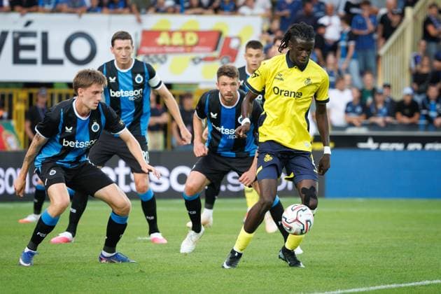 Club s Jorne Spileers and Union s Massire Sylla fight for the ball during a soccer match between Belgian champion Club Brugge KV and Cup winner Union Saint-Gilloise, Friday 31 July 2026 in Brussels, the Super Cup where the Champion of the Jupiler Pro League meets the winner of the Croky Cup. KURTxDESPLENTER  x182512322x