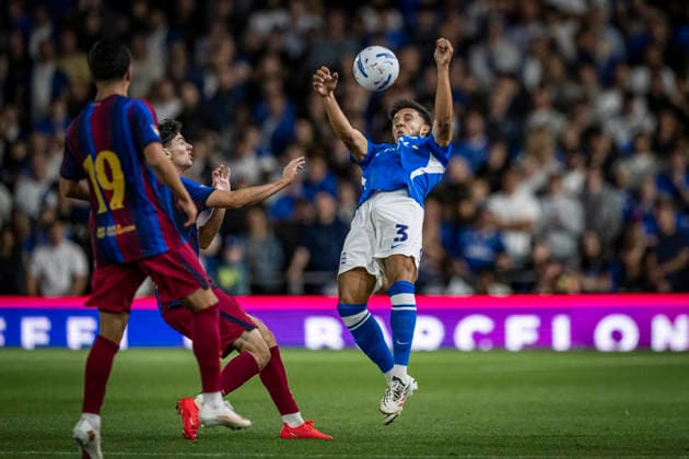 RECORD DATE NOT STATED 31st July 2026; St Andrews, Birmingham, West Midlands, England; Friendly Football, Birmingham City versus Barcelona; Lee Buchanan of Birmingham City wins a header ahead of Oscar Gistau of FC Barcelona, Barca GodfreyxPitt