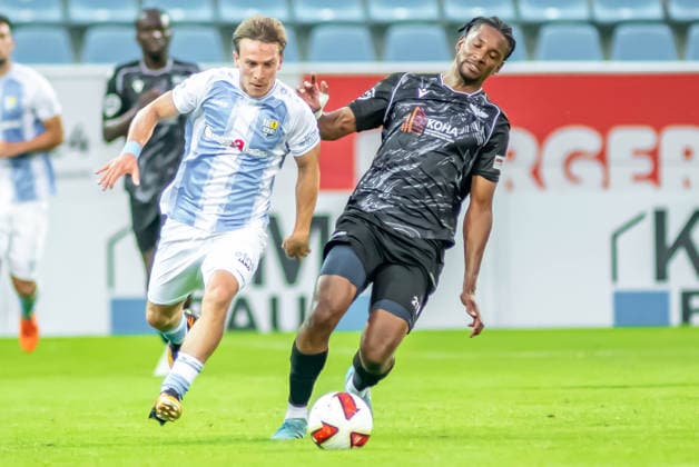 Chemnitz, Deutschland 31. Juli 2026: Regionalliga Nordost - 2026 2027 - Sp. 2 - Chemnitzer FC gegen BFC Preussen Im Bild: v. li. im Zweikampf Maximilian Fesser (CFC) und Charmaine Häusl (BFC) *** Chemnitz, Germany, July 31, 2026; Northeast Regional League 2026–2027, Matchday 2: Chemnitzer FC vs. BFC Preussen. Pictured, from left, in a tackle: Maximilian Fesser (CFC) and Charmaine Häusl (BFC). Copyright: xFotostandx xNachtigallx