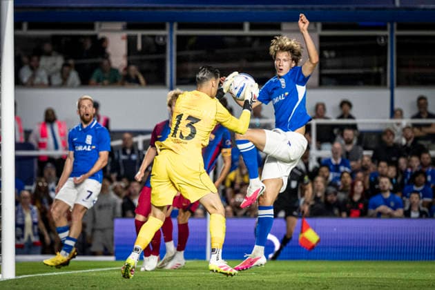 RECORD DATE NOT STATED 31st July 2026; St Andrews, Birmingham, West Midlands, England; Friendly Football, Birmingham City versus Barcelona; Joan Garcia of FC Barcelona, Barca ctaches the ball ahead of August Priske of Birmingham City GodfreyxPitt
