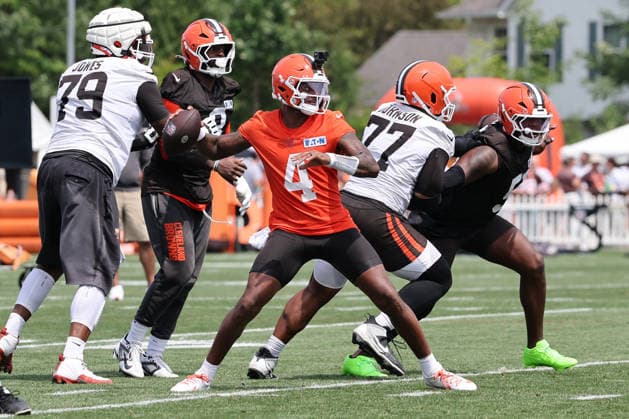 Cleveland Browns Deshaun Watson (4) throws from the pocket during training camp in Berea, Ohio on Friday July 31, 2026.  CLE20260731125 AARONxJOSEFCZYK