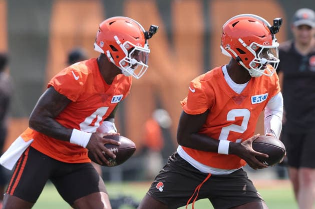 Cleveland Browns Shedeur Sanders (2) and Deshaun Watson (4) run passing drills during training camp in Berea, Ohio on Friday July 31, 2026.  CLE20260731126 AARONxJOSEFCZYK