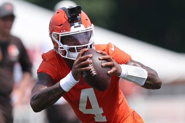 Cleveland Browns Deshaun Watson (4) rolls out to pass during training camp in Berea, Ohio on Friday July 31, 2026.  CLE20260731127 AARONxJOSEFCZYK