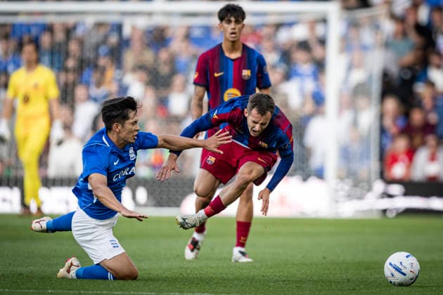 RECORD DATE NOT STATED 31st July 2026; St Andrews, Birmingham, West Midlands, England; Friendly Football, Birmingham City versus Barcelona; Marc Casado of FC Barcelona, Barca is fouled by Tomoki Iwata of Birmingham City GodfreyxPitt