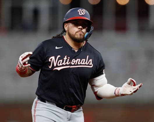Pinch hitter Andres Chaparro 87 of the Washington Nationals reacts after hitting a solo home run in the ninth inning against the Atlanta Braves at Truist Park on Friday, July 31, 2026 in Atlanta, Georgia.  ATL20260731123 MikexZarrilli