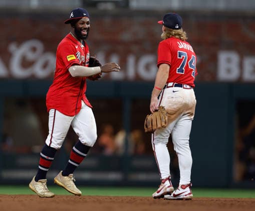 Centerfielder Michael Harris, Jr. II 23 of the Atlanta Braves (left) celebrates with shortstop Jim Jarvis 74 (right) after the game against the Washington Nationals at Truist Park on Friday, July 31, 2026 in Atlanta, Georgia.  ATL20260731124 MikexZarrilli