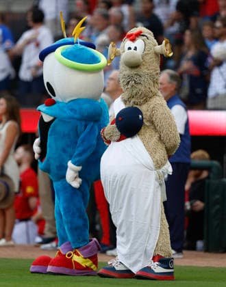 Atlanta Braves mascot Blooper pauses for the national anthem with 1996 Atlanta Olympic Games, Olympische Spiele, Olympia, OS mascot before the game between the Washington Nationals and the Atlanta Braves at Truist Park on Friday, July 31, 2026 in Atlanta, Georgia.  ATL20260731125 MikexZarrilli