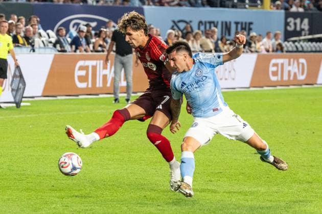 July 31, 2026, Bronx, New York, USA: Nicolas Fernandez Mercau (7) of NYCFC and Theo Corbeanu (7) of Toronto FC fight the ball during Regular Season game between NYCFC and Toronto FC at Yankee stadium in New York, NY on July 31, 2026. Game ended in draw 1 - 1. Bronx USA - ZUMAr339 20260731_znp_r339_074 Copyright: xLevxRadinx