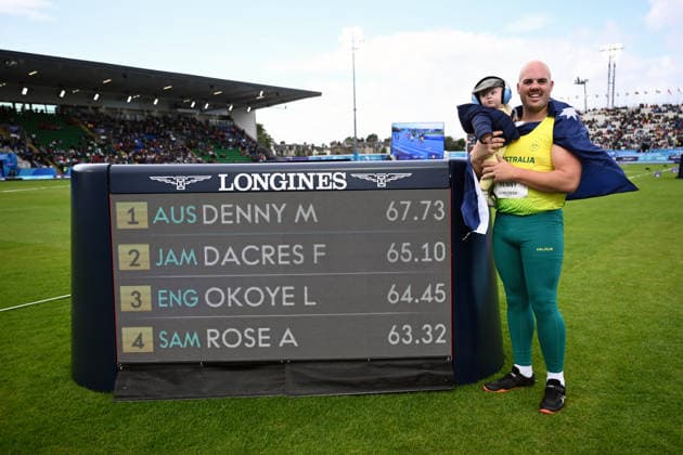 COM26 ATHLETICS, Matt Denny of Australia celebrates with his son Roman after winning the Men s Discus Throw Final during the Glasgow 2026 Commonwealth Games at Scotstoun Stadium in Glasgow, Scotland, Saturday, August 1, 2026. ( NO ARCHIVING, EDITORIAL USE ONLY Glasgow United Kingdom  Copyright: xJOELxCARRETTx 20260801196619491315