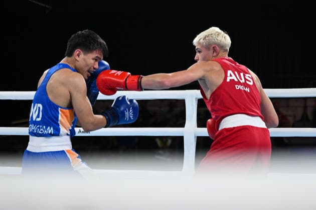 COM26 BOXING, Jye Dixon of Australia competes with Jadumani Singh Mandengbam of India during the Men™s 55kg Final Bout of the Glasgow 2026 Commonwealth Games at SEC Centre in Glasgow, Scotland, Saturday, August 1, 2026. ( NO ARCHIVING, EDITORIAL USE ONLY Glasgow Scotland United Kingdom  Copyright: xLUKASxCOCHx 20260801194401561201