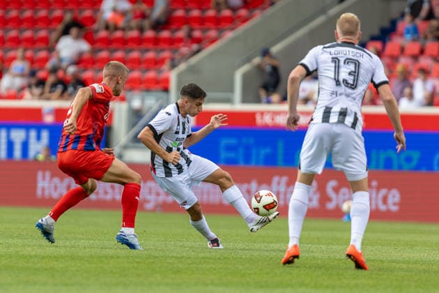 Zweikampf Adrian Beck (1.FC Heidenheim, 21) Fredrik Carlsen (FC Ingolstadt 04, 08) davor Lars Lokotsch (FC Ingolstadt 04, 13), GER, 1. FC Heidenheim vs. FC Ingolstadt, Fußball, Max-Liebhaber-Pokal, 2026 2027, 01.08.2026, DFL DFB REGULATIONS PROHIBIT ANY USE OF PHOTOGRAPHS AS IMAGE SEQUENCES AND OR QUASI-VIDEO, GER, 1. FC Heidenheim vs. FC Ingolstadt, Fußball, Max-Liebhaber-Pokal, 2026 2027, 01.08.2026 Heidenheim *** Head-to-head: Adrian Beck (1 FC Heidenheim), 21; Fredrik Carlsen (FC Ingolstadt 04), 08; Lars Lokotsch (FC Ingolstadt 04), 13; GER, 1 FC Heidenheim vs. FC Ingolstadt, Soccer, Max Liebhaber Cup, 2026–2027, August 1, 2026, DFL and DFB regulations prohibit any use of photographs as image sequences and or quasi-video, GER, 1 FC Heidenheim vs. FC Ingolstadt, soccer, Max Liebhaber Cup, 2026–2027, August 1, 2026, Heidenheim Copyright: xEibner-Pressefoto JanixPlessx EP_JPL