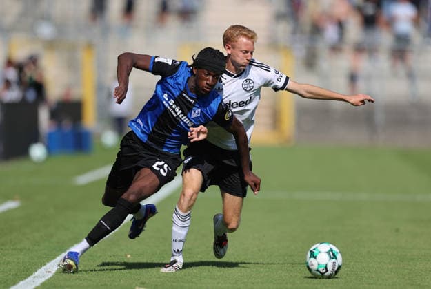 01.08.2026, Fussball Testspiel, SV Waldhof Mannheim - Eintracht Frankfurt, emspor, bespor, sespor, v.l., Jidechi Okeke (SV Waldhof Mannheim), Hugo Larsson (Eintracht Frankfurt) DFL DFB REGULATIONS PROHIBIT ANY USE OF PHOTOGRAPHS AS IMAGE SEQUENCES AND OR QUASI-VIDEO. xdcx *** August 1, 2026, Soccer Friendly Match, SV Waldhof Mannheim vs. Eintracht Frankfurt, emspor, bespor, sespor, v l, Jidechi Okeke (SV Waldhof Mannheim), Hugo Larsson (Eintracht Frankfurt). DFL and DFB regulations prohibit any use of photographs as image sequences and or quasi-video. xdcx Copyright: HMBxMedia Claus