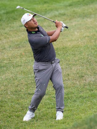 DETROIT, MI - AUGUST 01: Si Woo Kim (KOR) chips the ball onto the green during the third round of the Rocket Classic at Detroit Golf Club on August 01, 2026, in Detroit, Michigan. (Photo by Joseph Weiser Icon Sportswire) GOLF: AUG 01 PGA, Golf Herren Rocket Classic EDITORIAL USE ONLY Icon2608010083