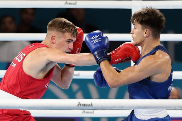 August 1, 2026, Glasgow, Scotland, Great Britain: PATRIS MUGHALZAI of England (blue) against JACOB CASSAR of Australia (red) in the Boxing Men s Welterweight 65kg Final of the Commonwealth Games Glasgow 2026 at the SEC Hall 5 in Glasgow, Scotland. Commowealth Games 2026: Boxing  - ZUMAc179 20260801_zep_c179_100 Copyright: xMickaelxChavetx