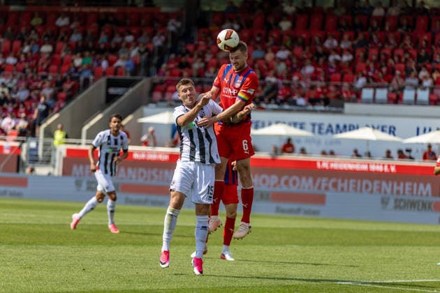Kopfballduell Patrick Mainka (1.FC Heidenheim, 06) Jonas Scholz (FC Ingolstadt 04, 15), GER, 1. FC Heidenheim vs. FC Ingolstadt, Fußball, Max-Liebhaber-Pokal, 2026 2027, 01.08.2026, DFL DFB REGULATIONS PROHIBIT ANY USE OF PHOTOGRAPHS AS IMAGE SEQUENCES AND OR QUASI-VIDEO, GER, 1. FC Heidenheim vs. FC Ingolstadt, Fußball, Max-Liebhaber-Pokal, 2026 2027, 01.08.2026 Heidenheim *** Heading duel: Patrick Mainka (1 FC Heidenheim), 06 Jonas Scholz (FC Ingolstadt 04), 15, GER, 1 FC Heidenheim vs. FC Ingolstadt, Soccer, Max Liebhaber Cup, 2026–2027, August 1, 2026, DFL and DFB regulations prohibit any use of photographs as image sequences and or quasi-video, GER, 1 FC Heidenheim vs. FC Ingolstadt, Soccer, Max Liebhaber Cup, 2026–2027, August 1, 2026, Heidenheim Copyright: xEibner-Pressefoto JanixPlessx EP_JPL